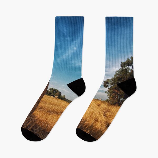 Item preview, Harvested field under a blue claen sky in the late summer designed and sold by cinemadnesshirt.
