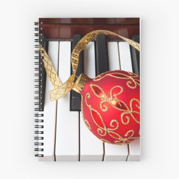 Item preview, Christmas ornament on piano keys designed and sold by Garry Gay.