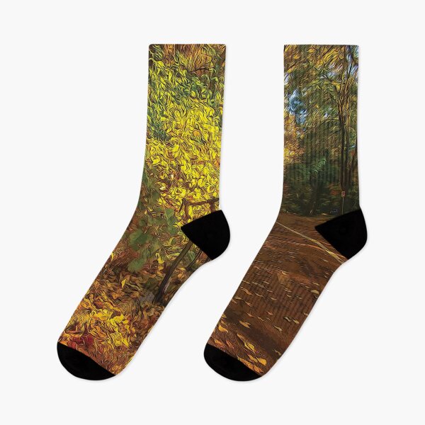 Item preview, Biking during fall season on a road full of leaves - designed and sold by FelCastro.