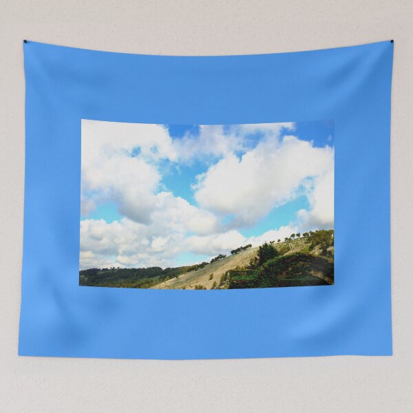 Item preview, Scene from Casertavecchia with huge white clouds designed and sold by Kristina Drozd.