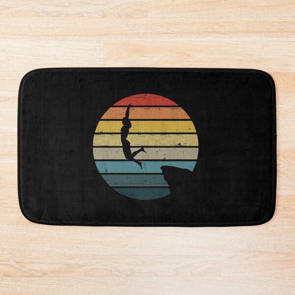 Item preview, Cliff Diving Silhouette On A Distressed Retro Sunset graphic designed and sold by theodoros20.