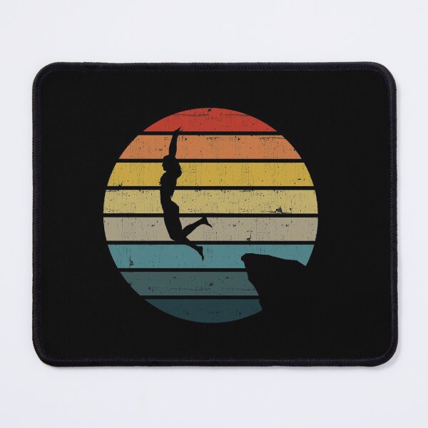 Item preview, Cliff Diving Silhouette On A Distressed Retro Sunset graphic designed and sold by theodoros20.