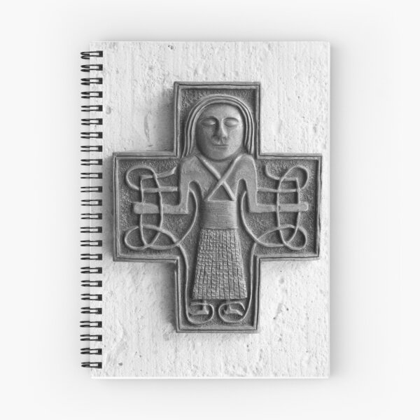 Item preview, Decorative cross on an albergue wall designed and sold by Richard McCaig.