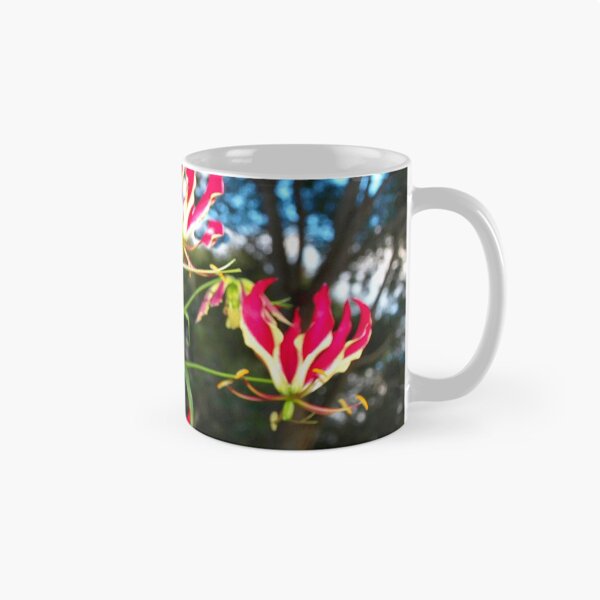 Item preview, Gloriosa lilies against a fence designed and sold by B. Randi Bailey.
