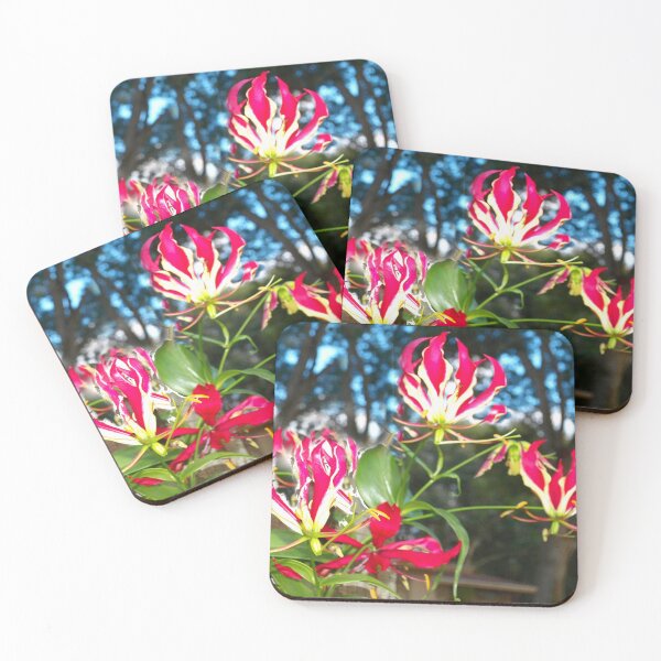 Item preview, Gloriosa lilies against a fence designed and sold by B. Randi Bailey.