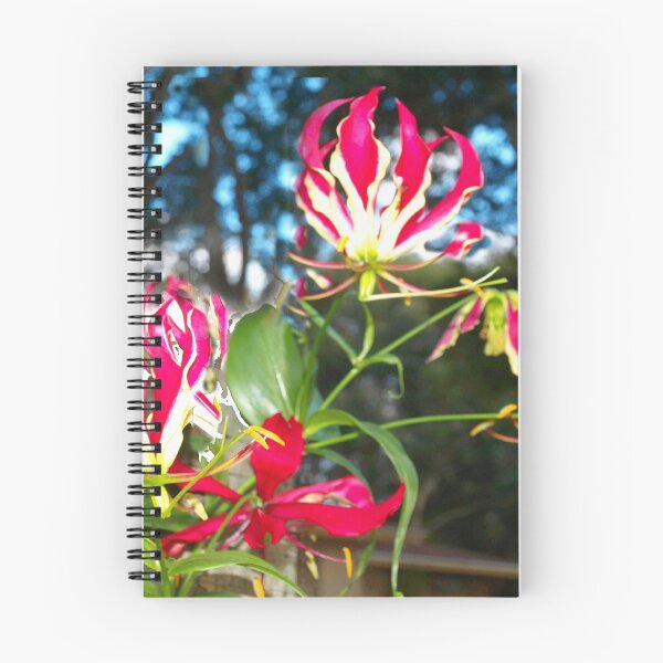 Item preview, Gloriosa lilies against a fence designed and sold by B. Randi Bailey.