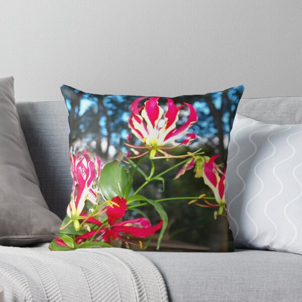 Item preview, Gloriosa lilies against a fence designed and sold by B. Randi Bailey.