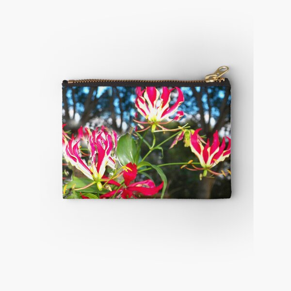Item preview, Gloriosa lilies against a fence designed and sold by B. Randi Bailey.