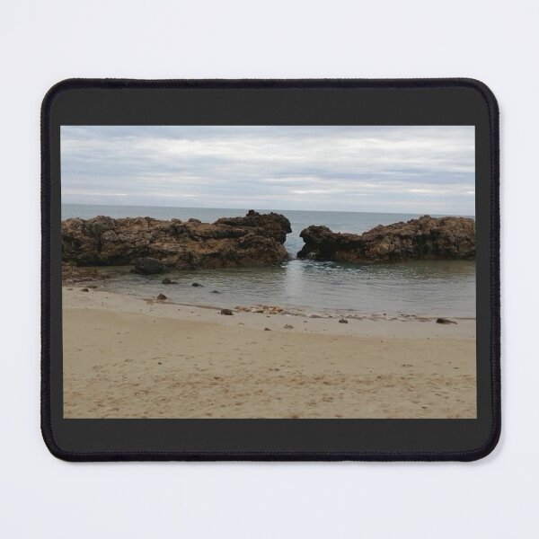 Item preview, A moment in the morning when the sea is calm and peaceful with no waves visible near two large rocks designed and sold by AnnaBBS.