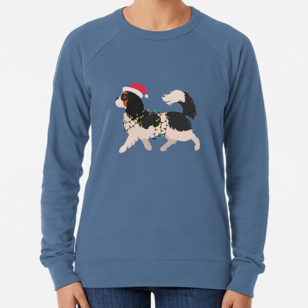 Vista previa del artículo con la obra «Cavalier King Charles Spaniel Tricolor Navidad», diseñado y vendido por Omoozo.