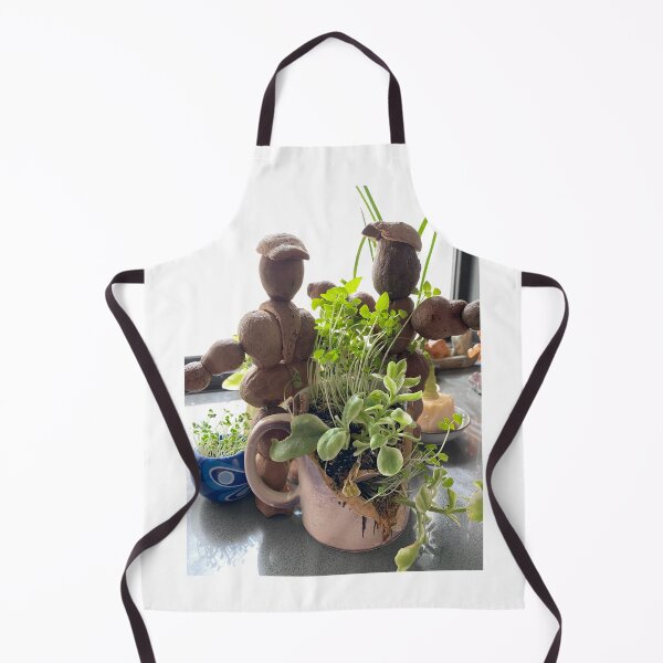 Item preview, gum nut humans gardening in a broken mug designed and sold by Lanie B Meyer.