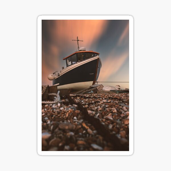 Beached fishing boat waiting for the next tide. Sticker