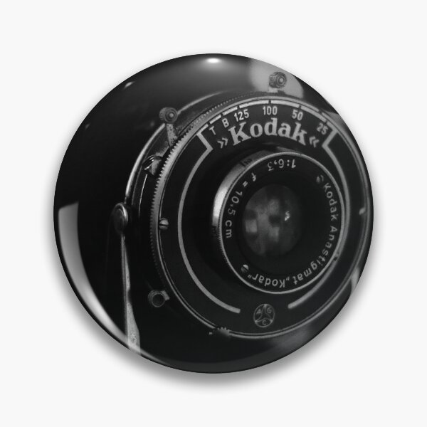 Item preview, Close-up photo of a retro analog camera in black and white designed and sold by Diana van Neck.