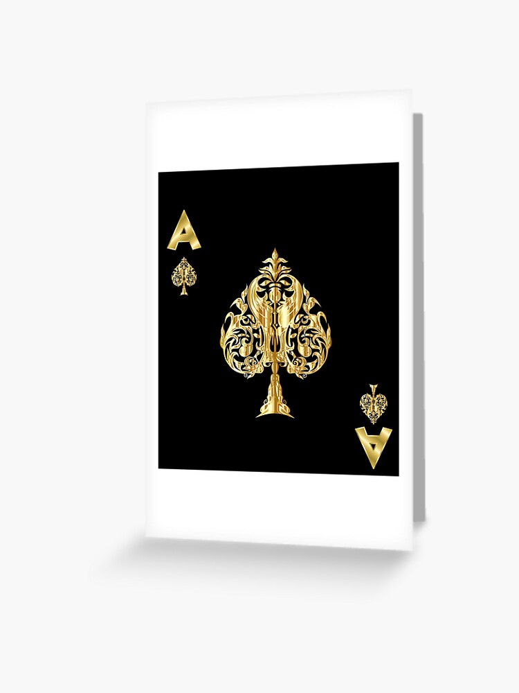 Premium Photo  A gold and black playing card with a gold ace of spades on  it.