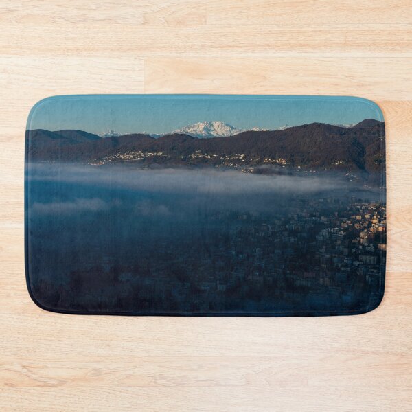 Item preview, Snow-capped Mountain Peak Monte Rosa Above Cloudscape and Lake Lugano with Sunlight and Clear Sky in City of Lugano designed and sold by Mats Silvan.