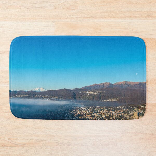Item preview, Snow-capped Mountain Peak Monte Rosa and the Moon Above Cloudscape and Lake Lugano with Sunlight and Clear Sky in City of Lugano designed and sold by Mats Silvan.