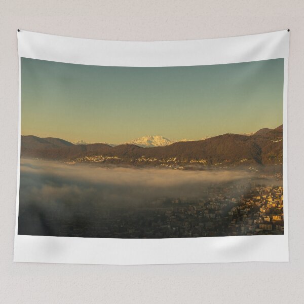 Item preview, Snow-capped Mountain Peak Monte Rosa Above Cloudscape and Lake Lugano with Sunlight and Clear Sky in City of Lugano designed and sold by Mats Silvan.