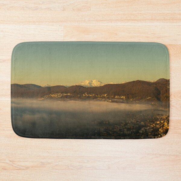 Item preview, Snow-capped Mountain Peak Monte Rosa Above Cloudscape and Lake Lugano with Sunlight and Clear Sky in City of Lugano designed and sold by Mats Silvan.