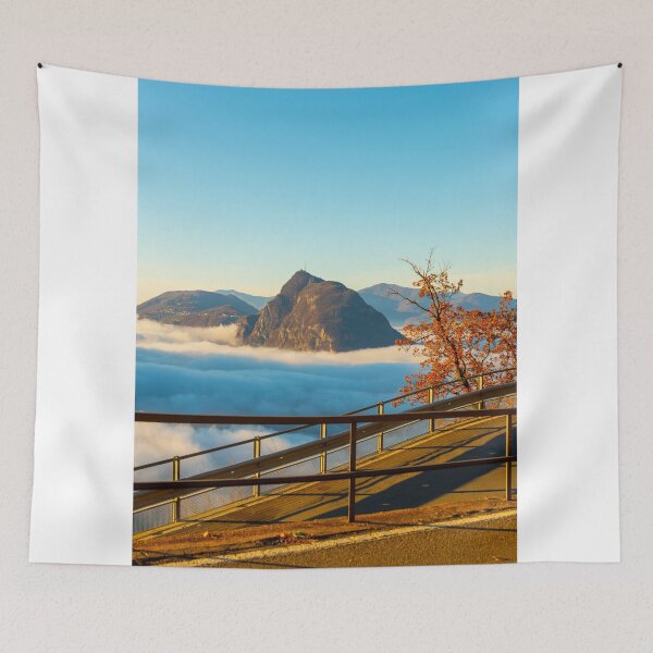 Item preview, Mountain Peak San Salvatore Above Cloudscape and Mountain Road with Sunlight and Clear Sky in Lugano designed and sold by Mats Silvan.