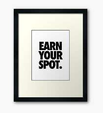EARN YOUR SPOT. Framed Print
