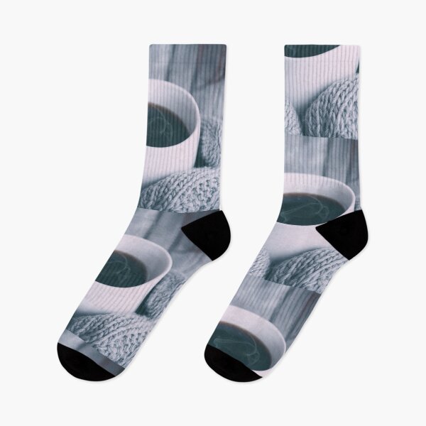 Item preview, A person in mittens holding a cup of hot coffee. designed and sold by maxshope.