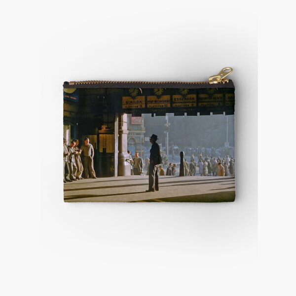 Item preview, Clockwatcher on entrance Flinders St station 19580904 0001 designed and sold by Fred Mitchell.
