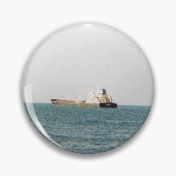 Item preview, 35 mm film photography of a boat in the sea with a clear blue sky designed and sold by Mmm-stuff.
