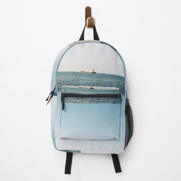 Item preview, 35 mm film photography of a boat in the sea with a clear blue sky designed and sold by Mmm-stuff.