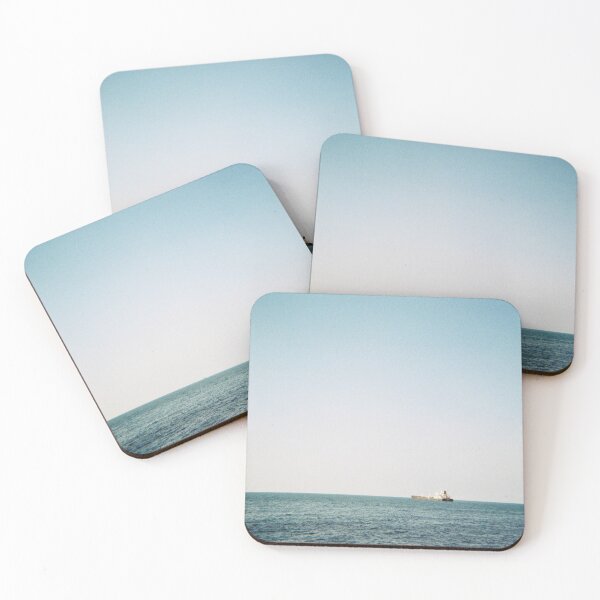 Item preview, 35 mm film photography of a boat in the sea with a clear blue sky designed and sold by Mmm-stuff.