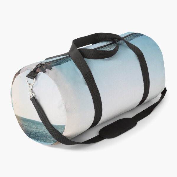 Item preview, 35 mm film photography of a boat in the sea with a clear blue sky designed and sold by Mmm-stuff.
