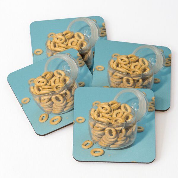 Item preview, Yellow small sushki bagels in glassware on a blue background. Bagels are scattered around designed and sold by Tae Mi.