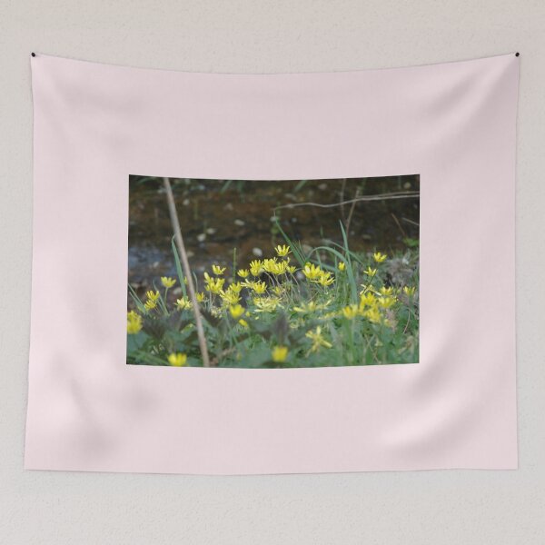 Item preview, Small yellow flowers next to a small river   designed and sold by GoyetteTravon.