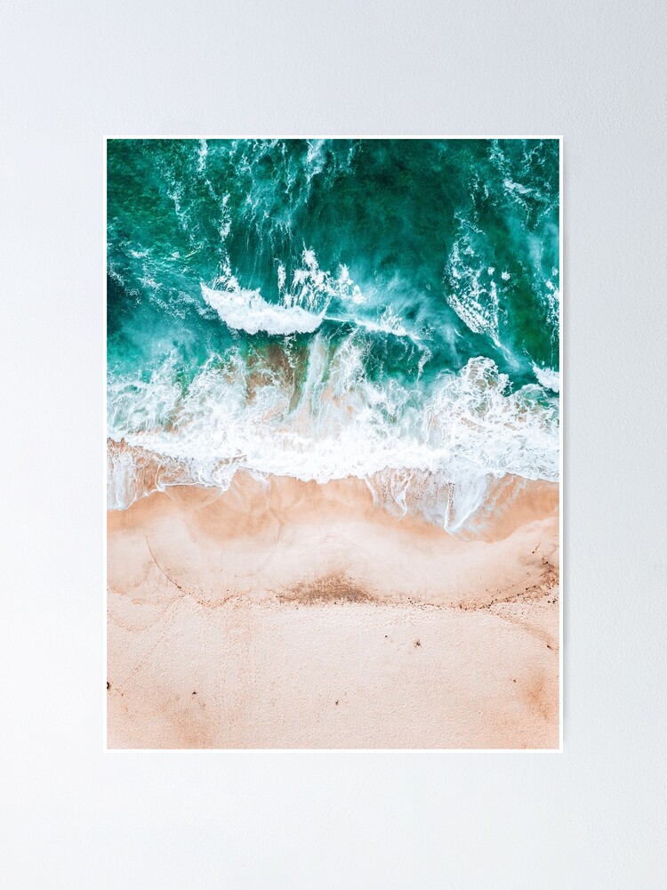 Ocean waves crashing on pink beach top view. Turquoise ocean receding waves  | Poster