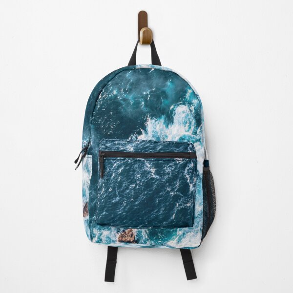 Item preview, Blue Ocean waves crashing on rocks top view designed and sold by HappyNoireArt.