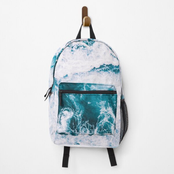 Item preview, Blue and foamy Ocean waves crashing on rocks top view designed and sold by HappyNoireArt.