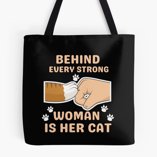 Item preview, Behind Every Strong Woman Is Her Cat designed and sold by Buzzbazaar.