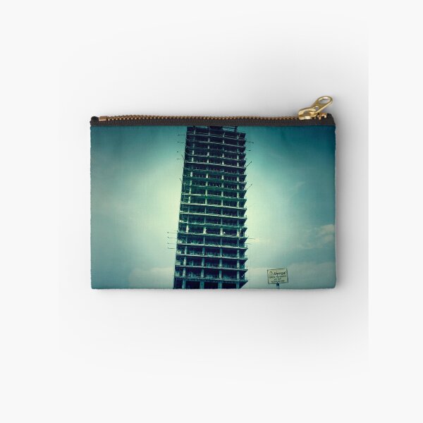 Item preview, Old unfinished building called "Skeleton". Yellow sign with the words "Do not enter!". Urban exploration photo designed and sold by aquapixel.