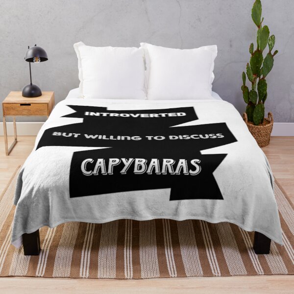 Item preview, Introverted but willing to discuss capybaras t-shirt Unisex.  designed and sold by Sloyar.