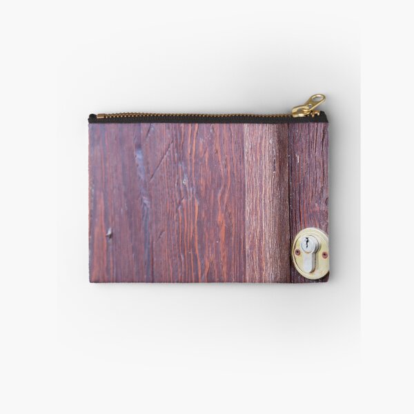 Item preview, Part of the wooden door brown close-up with brass keyhole designed and sold by vladromensky.
