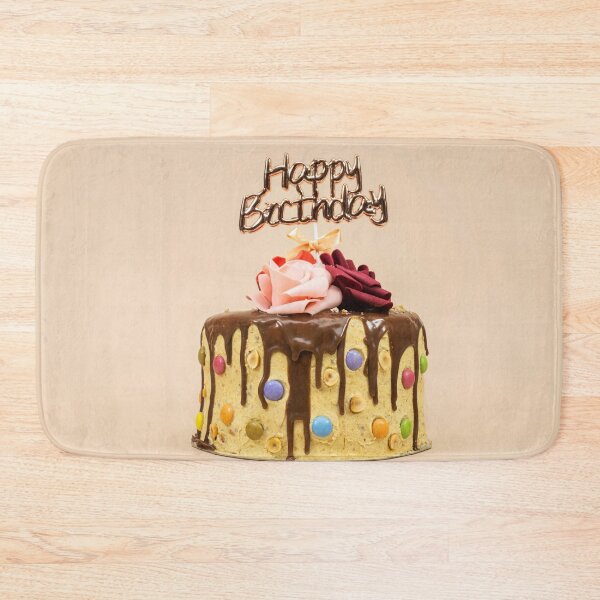 Item preview, Birthday layer cake decorated with chocolate pieces and happy birthday text, hazelnuts and roses flowers isolated on pink background designed and sold by sigoisette.