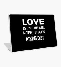 Love is in the air.nope, that’s Atkins Diet T-shirts Laptop Skin