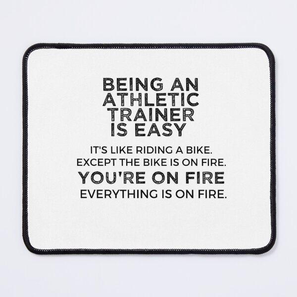 Item preview, Being An Athletic trainer Is Easy It's Like Riding A Bike. Except the Bike is on Fire. You're On Fire. Everything is on Fire. designed and sold by TeesYouWant.