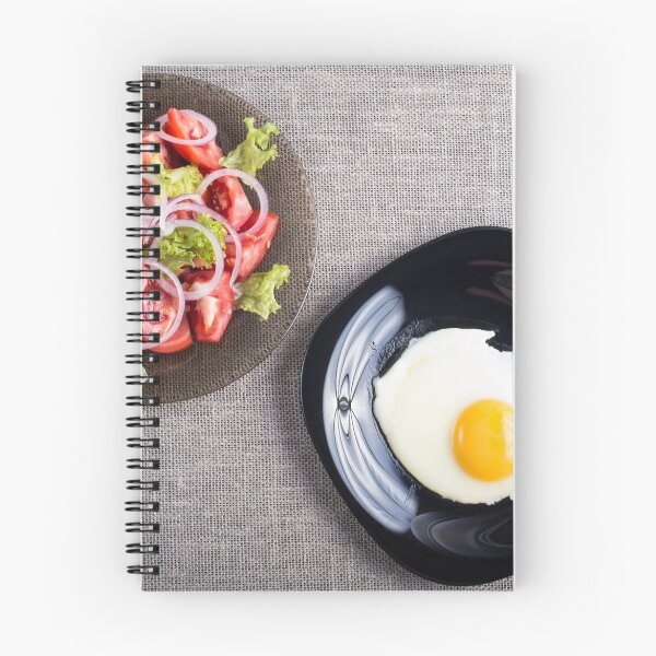 Item preview, Top view of a healthy homemade breakfast of fried egg and a salad designed and sold by vladromensky.