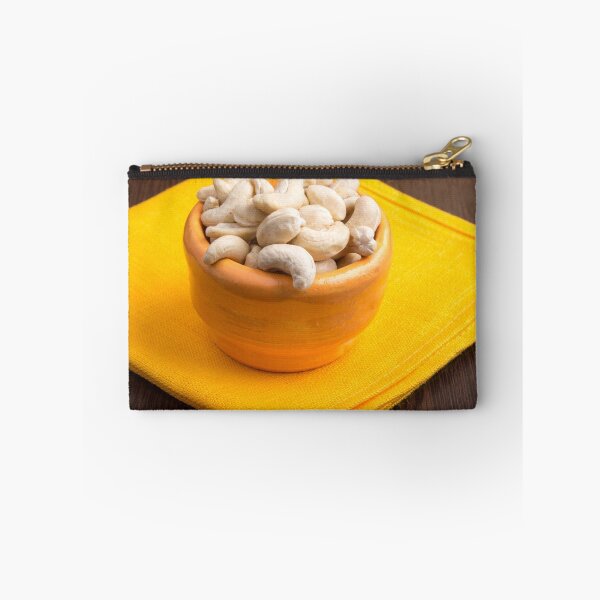 Item preview, Selective focus on raw cashew nuts closeup designed and sold by vladromensky.