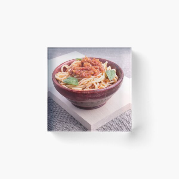 Item preview, Cooked spaghetti in a brown small wooden bowl designed and sold by vladromensky.