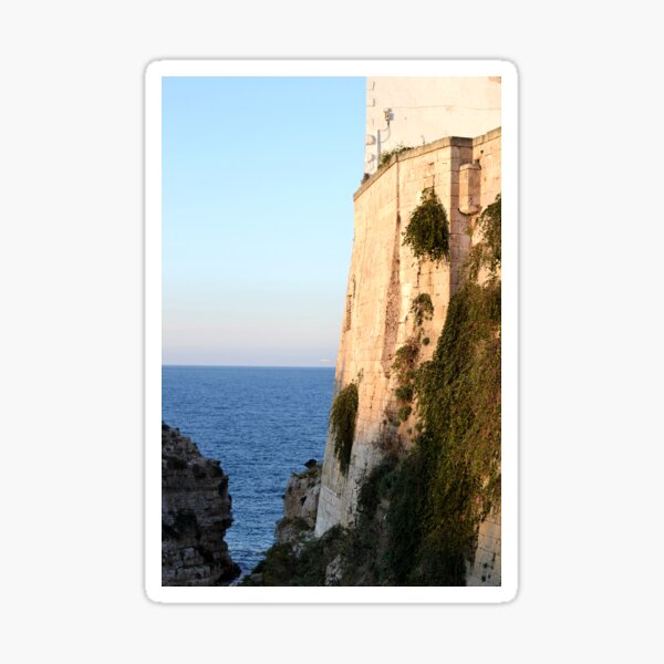 Beachside wall at sunset, Puglia Sticker