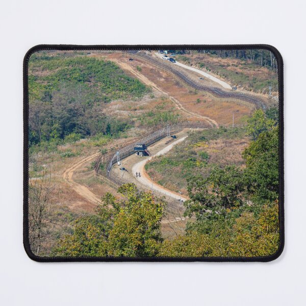 Item preview, Highly fortified border fence at the Korean DMZ, with watch towers, South Korea designed and sold by SnapTPhotograph.