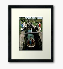 Narrow boat entering a lock on the Macclesfield canal, Cheshire, UK (1970s) Framed Print