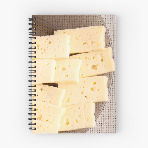 Item preview, Group slices dry hard yellow cheese on a plate designed and sold by vladromensky.