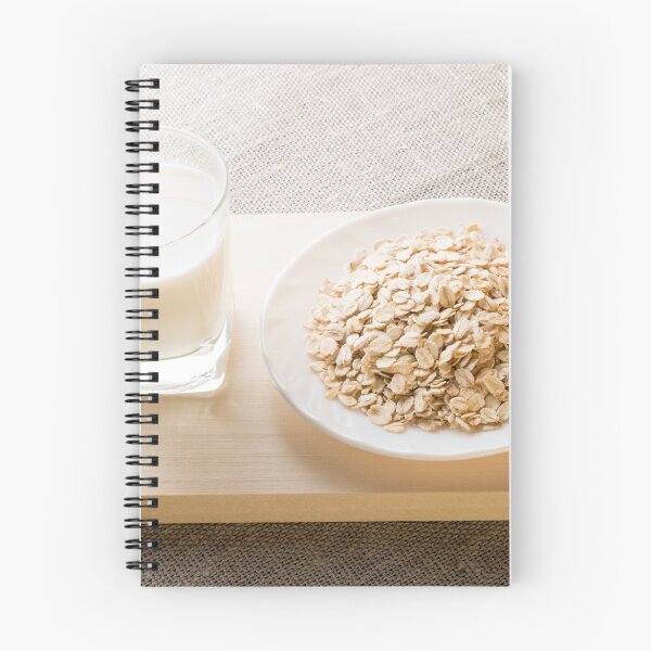 Item preview, Glass of milk and a plate of cereal closeup designed and sold by vladromensky.